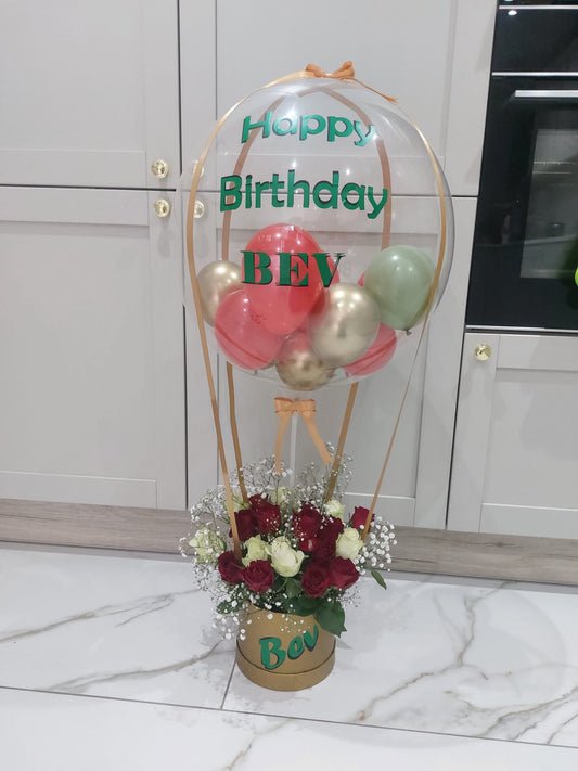 Balloon In A Hat Box Of Flowers With Balloons